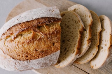 A bread loaf sliced up.