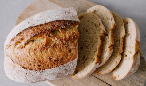 A bread loaf sliced up.