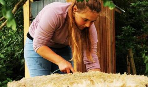 Woman working on an animal hide
