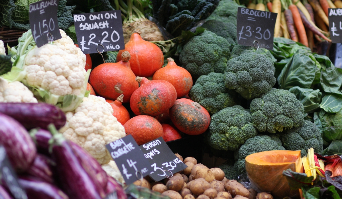 A stall of vegetables on display at a market