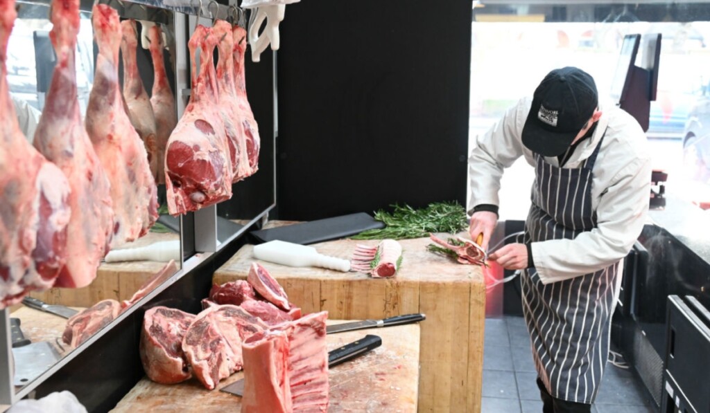 An employee working at Richard's butchers, Carnivore