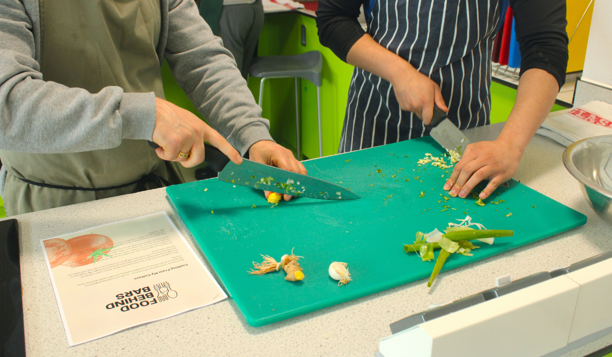 A cooking class taking place at HMP Bristol. Picture courtesy of Food Behind Bars